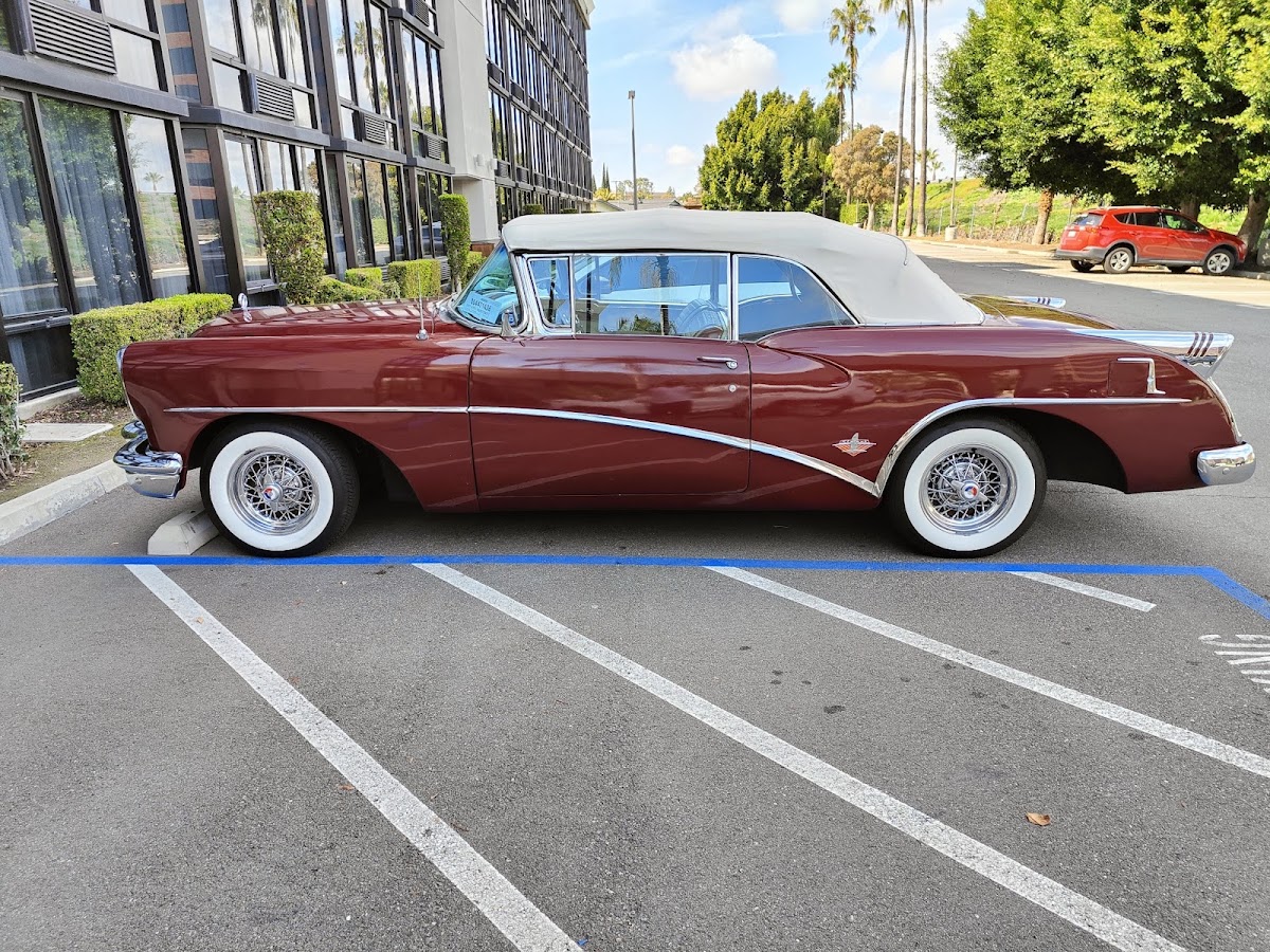 Classic maroon convertible serviced at Raul's Auto Service